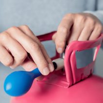 Eldobható hélium palack